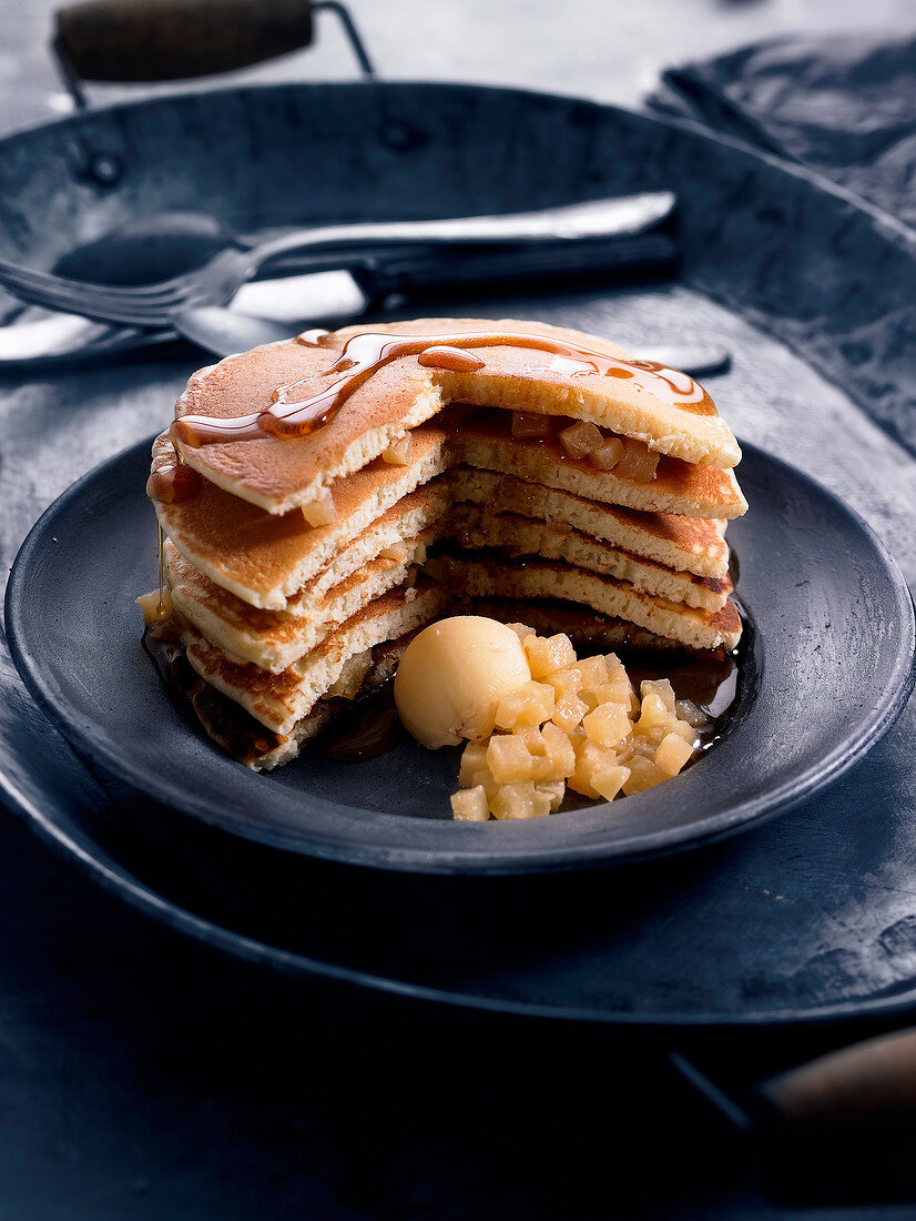 Layered pancake and pear cake with maple syrup