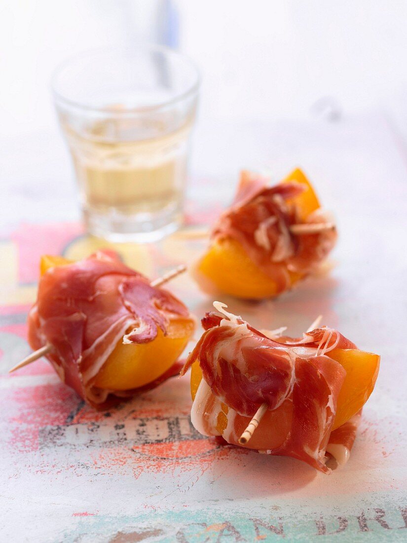 Apricots and Serrano ham bites