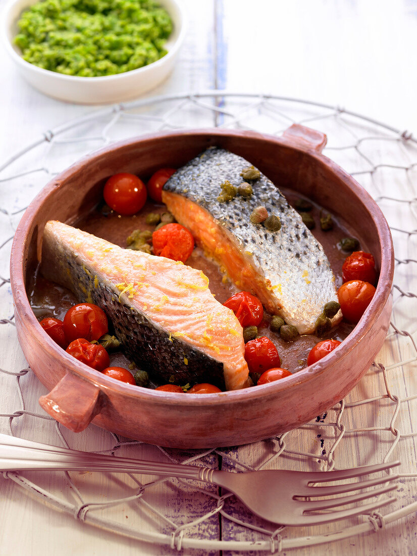 Roasted salmon with cherry tomatoes and capers