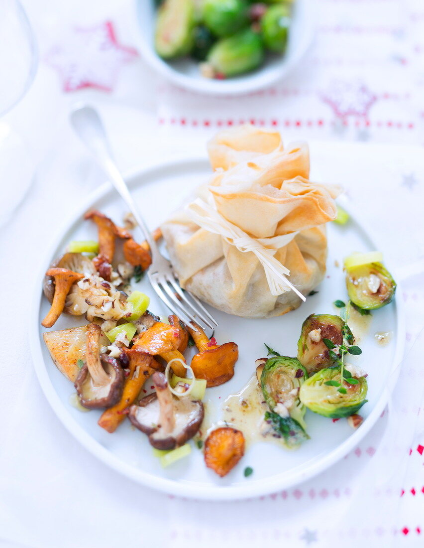 Brussels sprout filo pastry purse with sauteed mushrooms