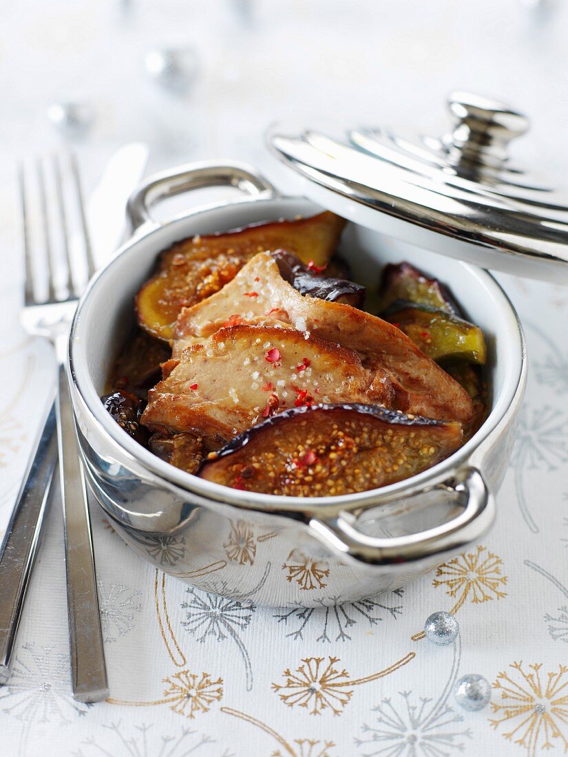 Small casserole dishes of foie gras and figs