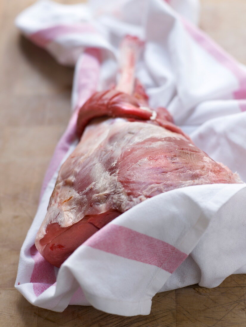 Raw leg of lamb