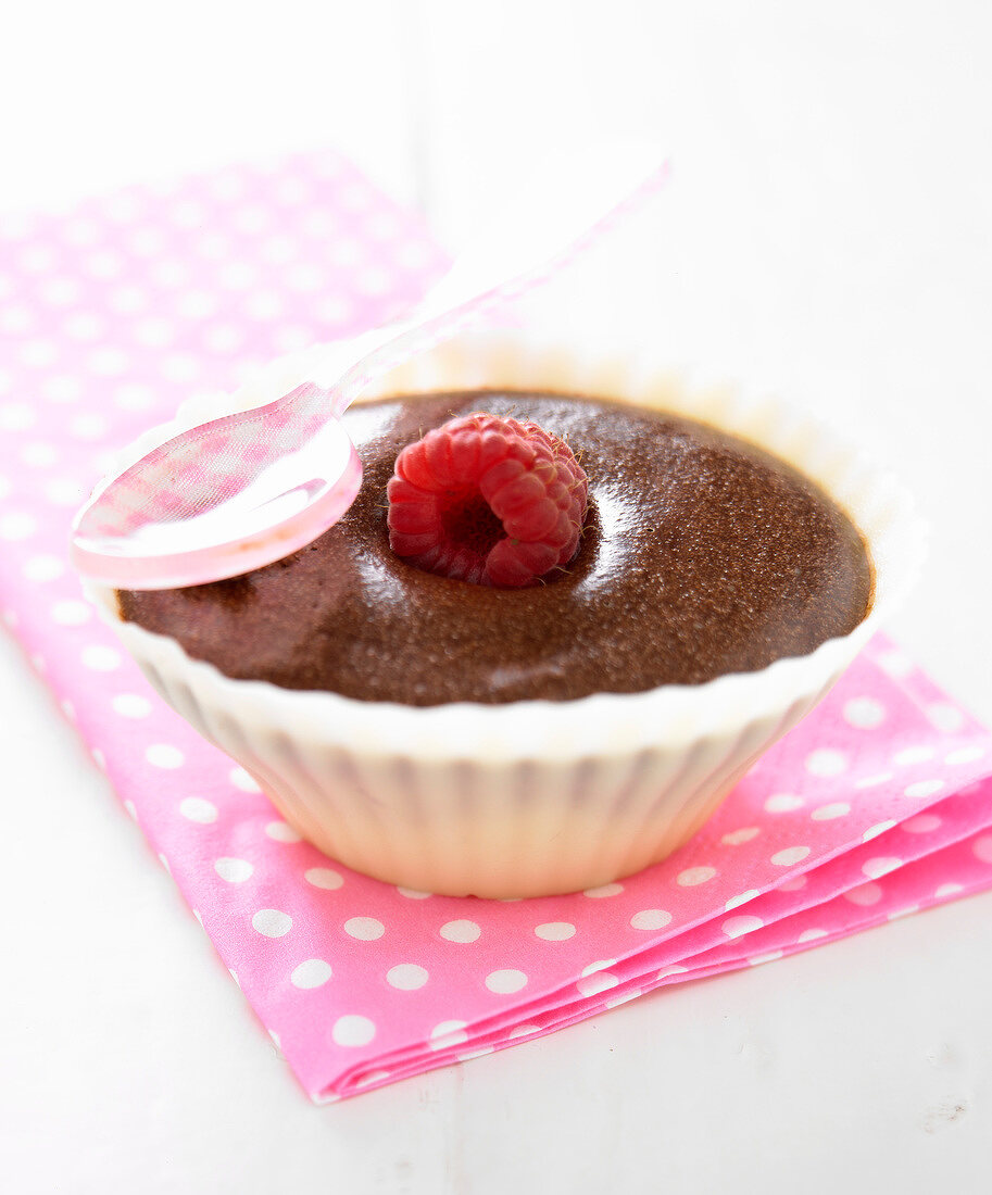 Chocolate mousse and raspberries in white chocolate casings