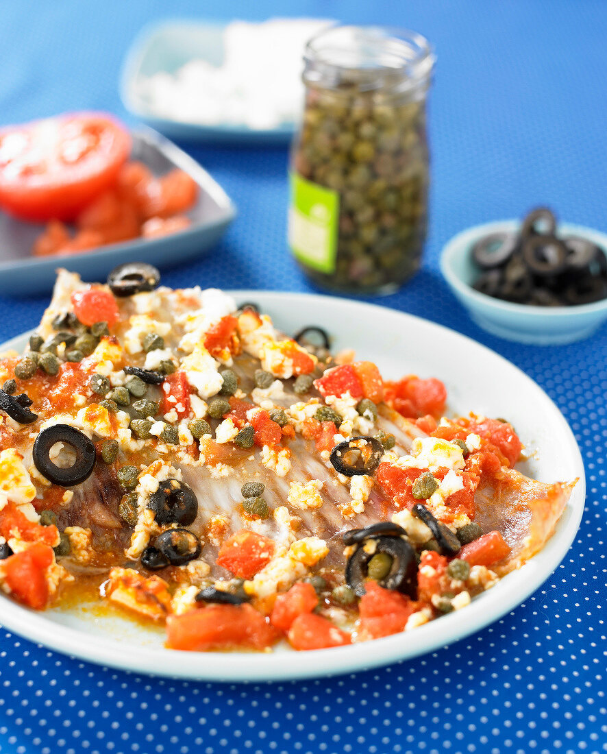 Skate with capers,olives and tomatoes