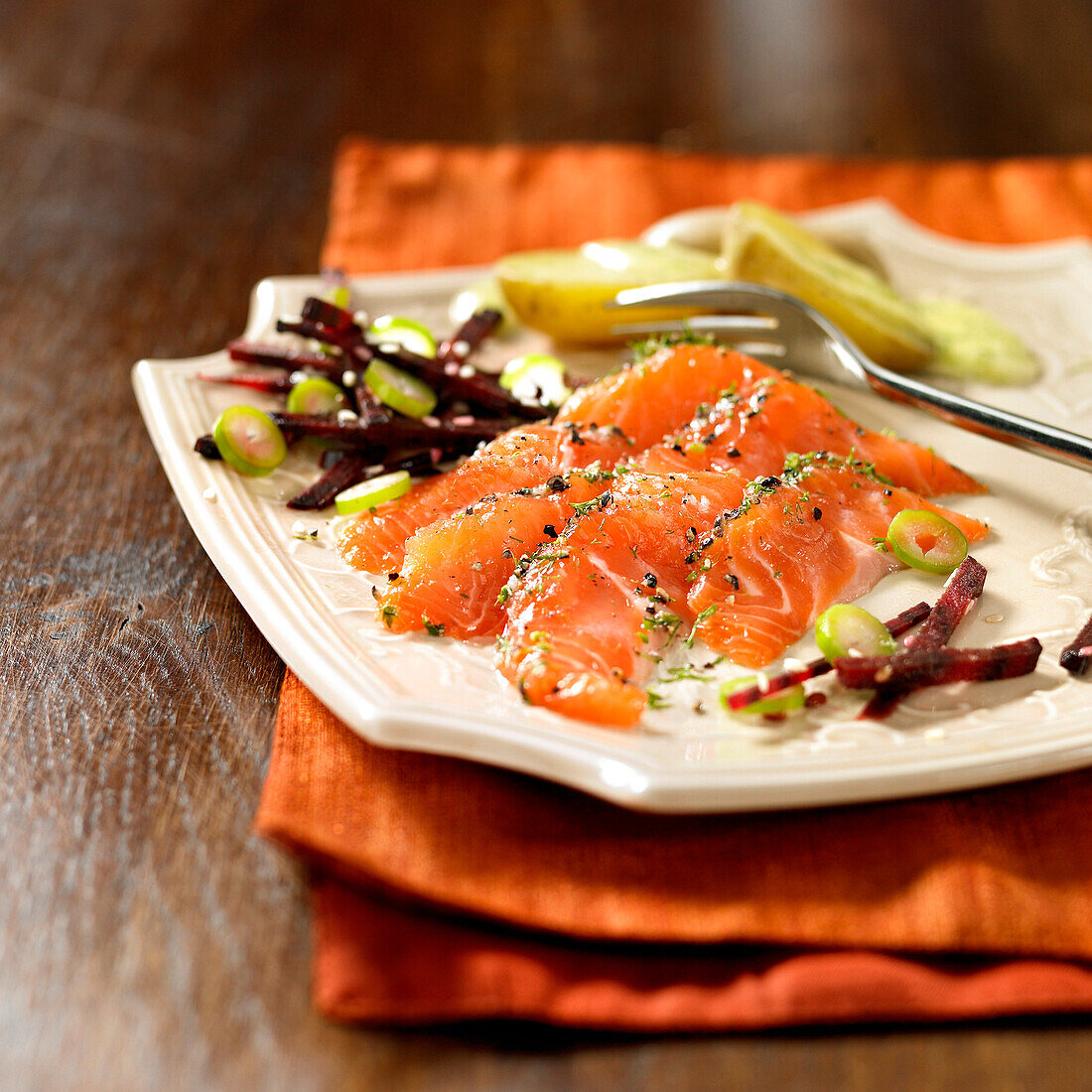 Salmon trout gravlax with mild pepper and beetroot