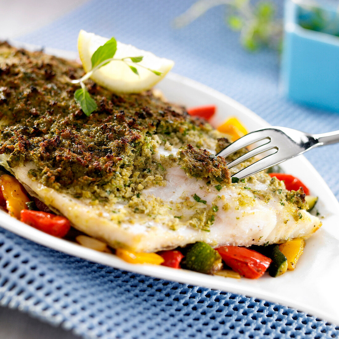 Perch fillet in basil crust with southern vegetables