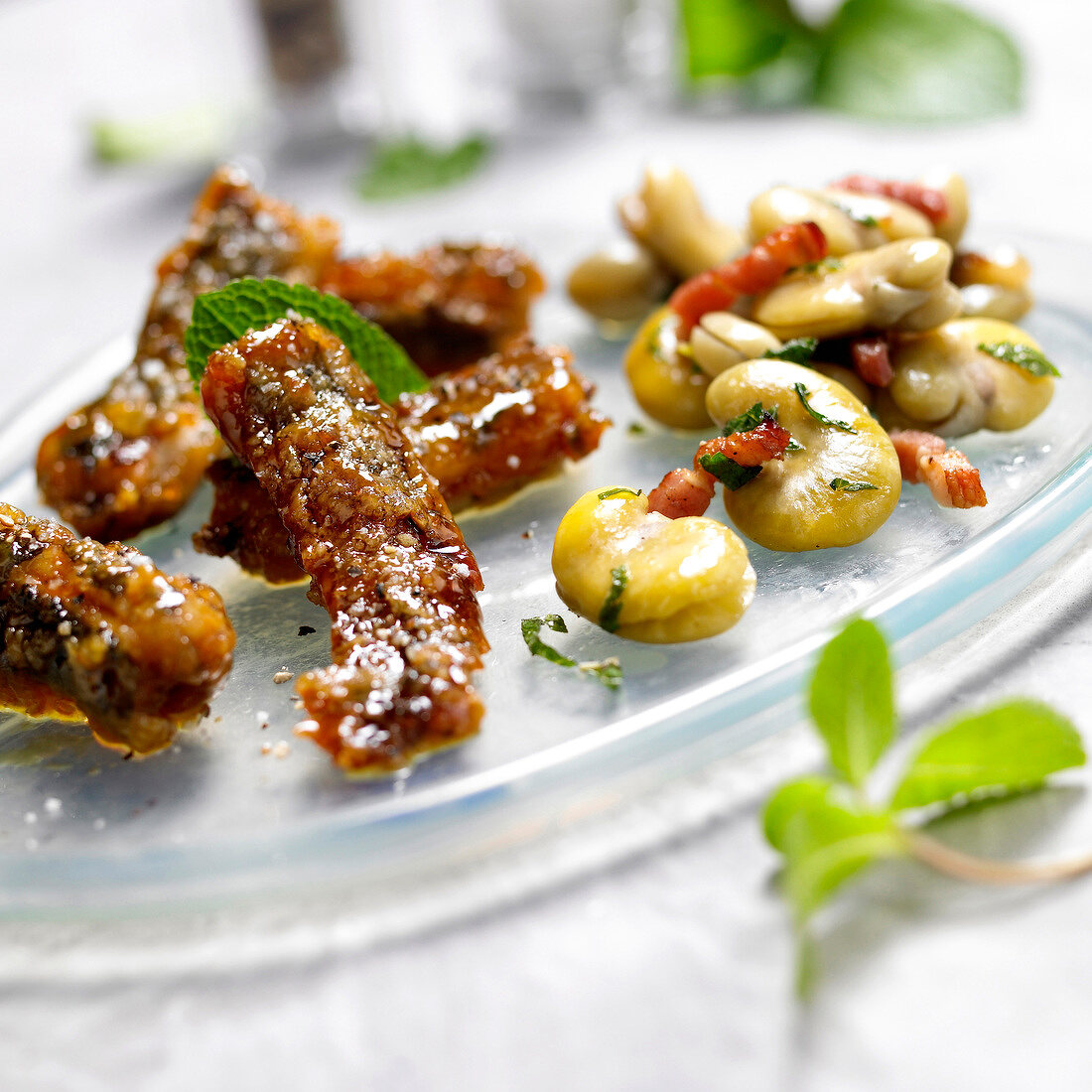 Eels in honey,broad beans with diced bacon