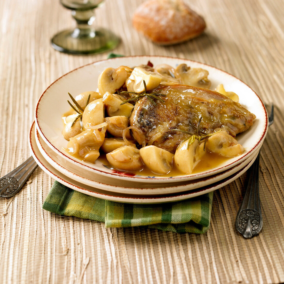 Pheasant with mushrooms and rosemary