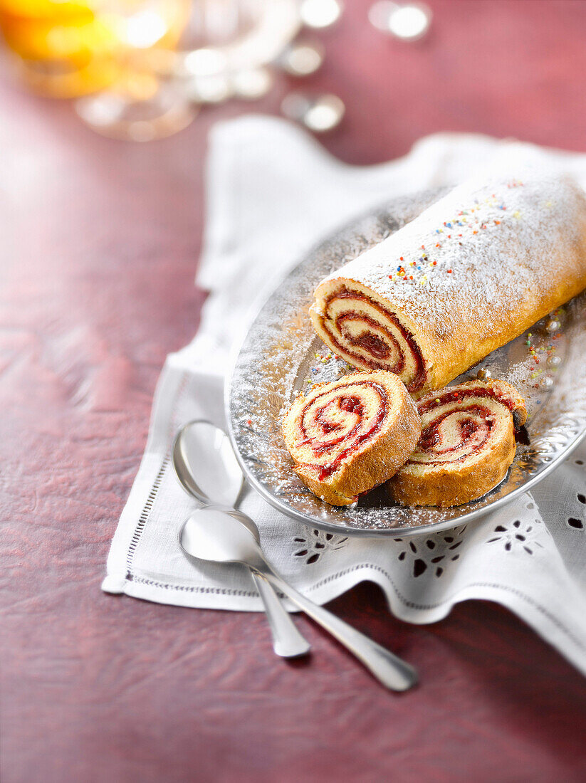 Redcurrant jam rolled sponge cake