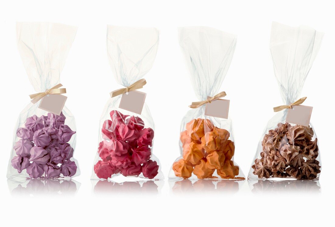 Four bags of different flavored meringues