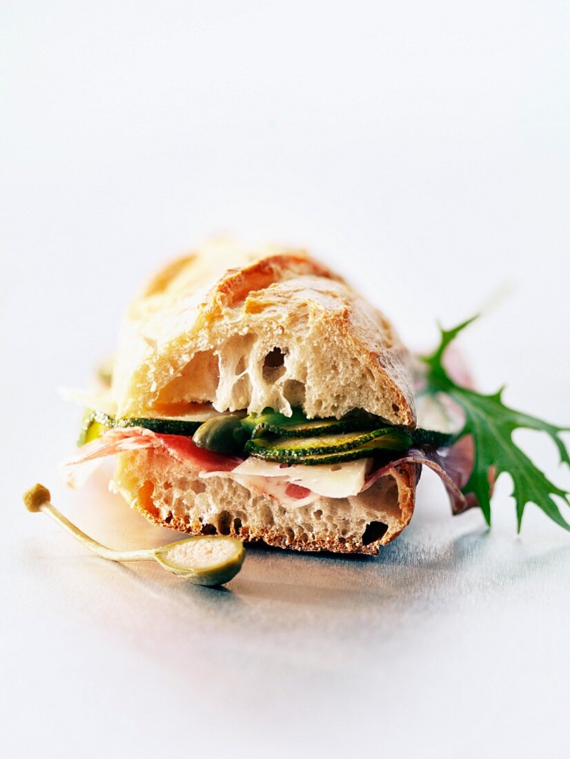 Raw ham and zucchini baguette sandwich