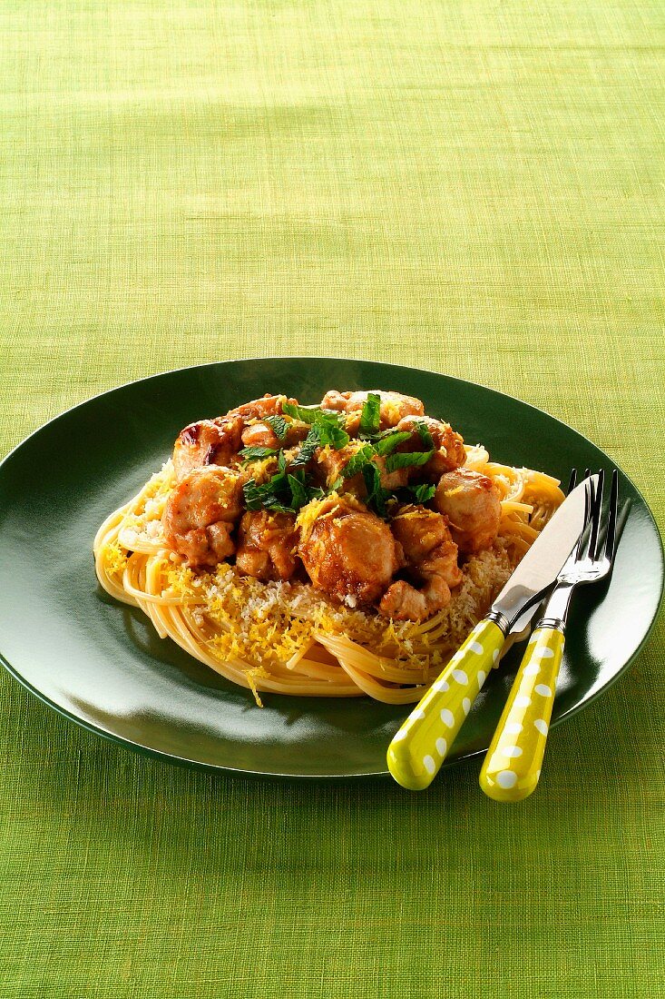 Spaghetti with diced rabbit,lemon and mint