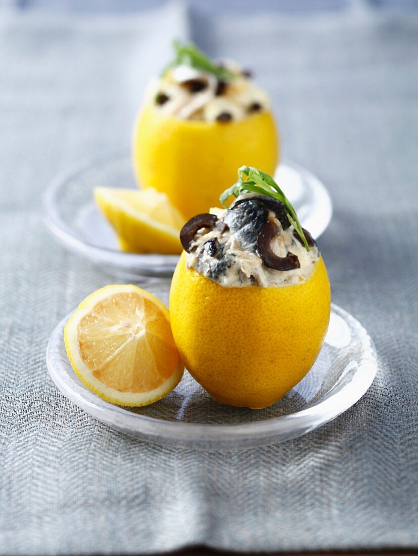 Lemons stuffed with sardine and black olive paté