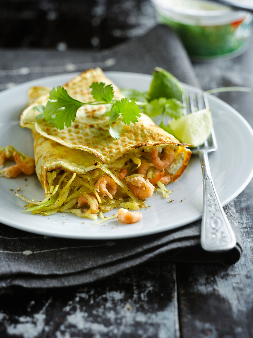 Pancake stuffed with shrimps and cabbage