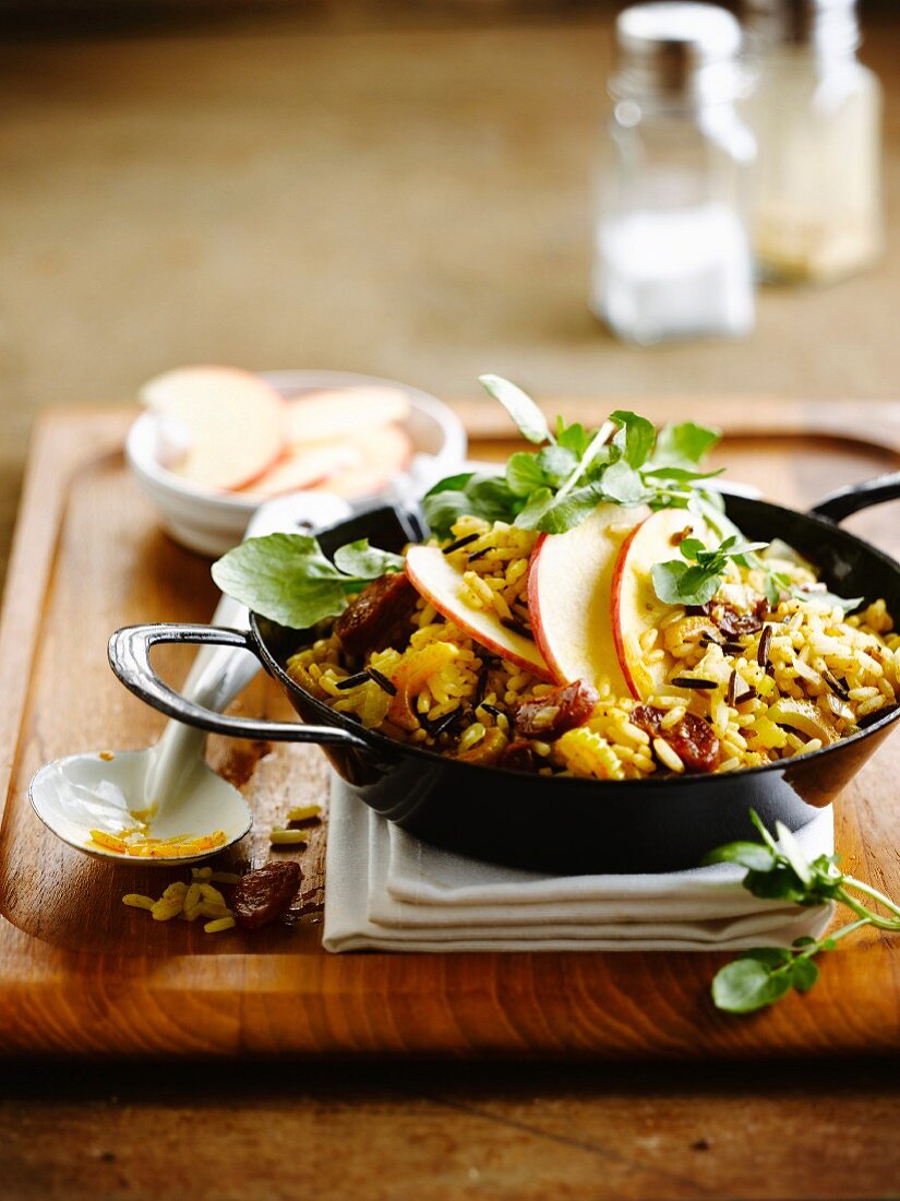 Sauteed rice with Chorizo, apple and celery stalks