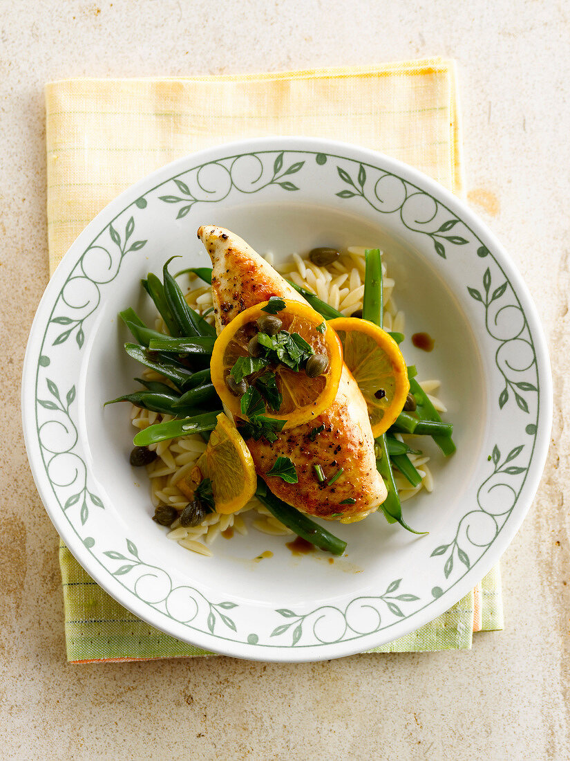 Chicken Piccata with green beans and orzo