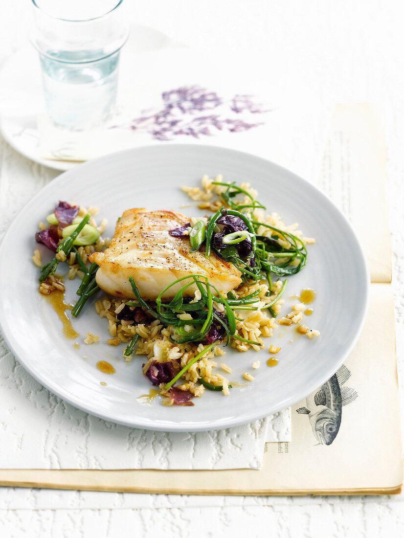 Sweet and sour cod fillet and sauteed rice with seaweed