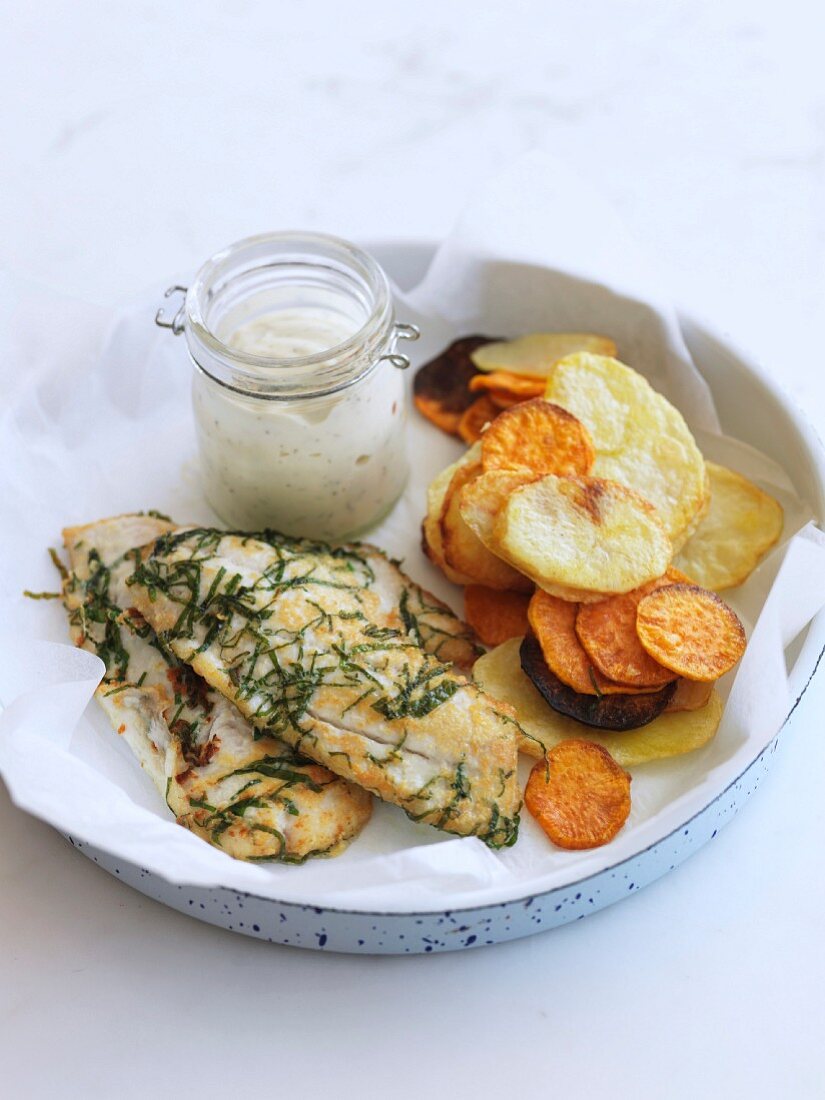 Fried cod fillets with herbs and sauteed potatoes