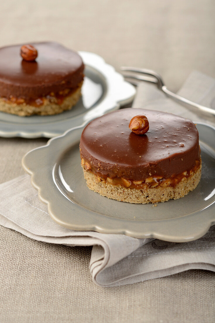 Hazelnut, toffee and milk chocolate tartlets