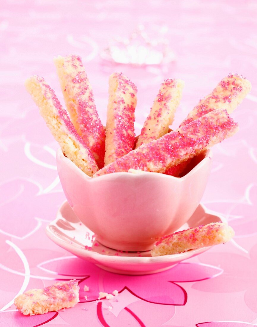 Hazelnut shortbread sticks coated in pink sugar