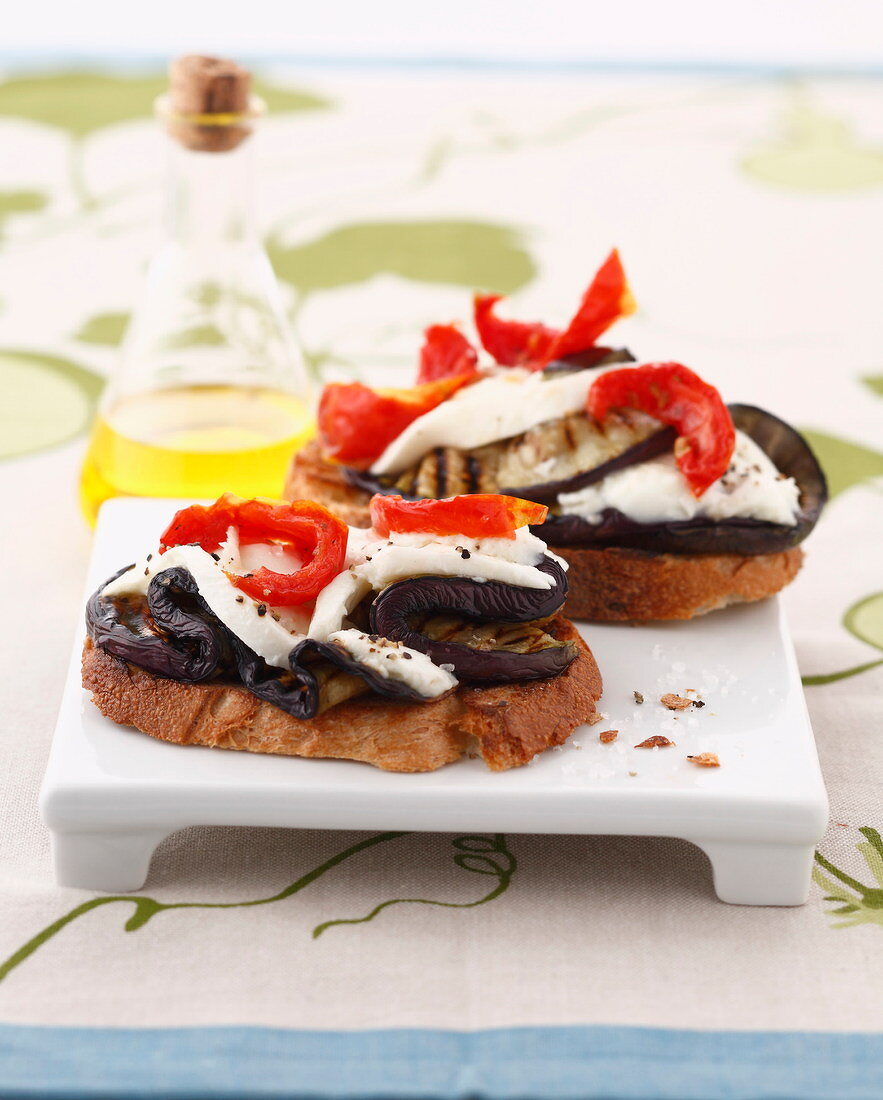 Tomato, mozzarella and eggplant open sandwiches