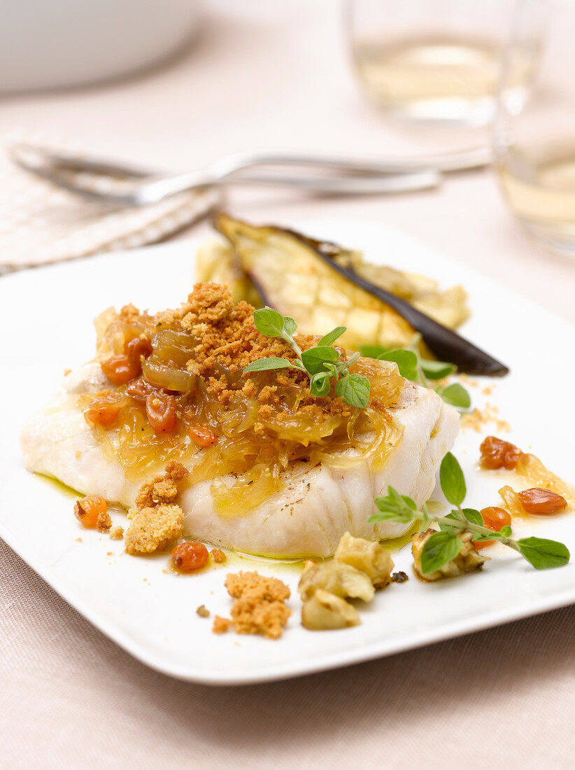 Cod coated with raisin and onion crumble, grilled eggplants