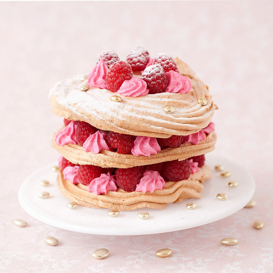 Meringue,pink whipped cream and raspberry Mille-feuille