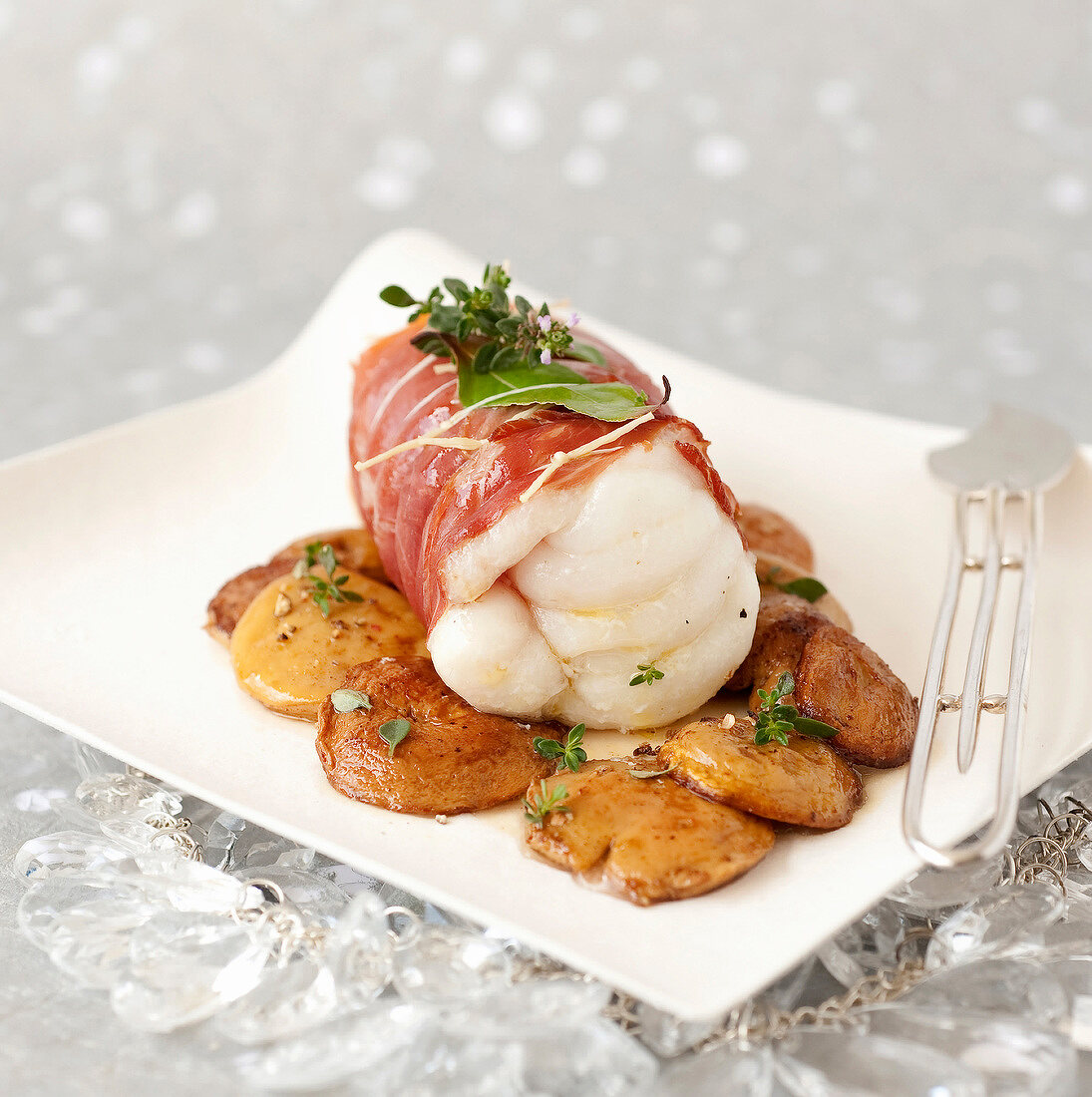 Roasted monkfish wrapped in bacon,pan-fried ceps