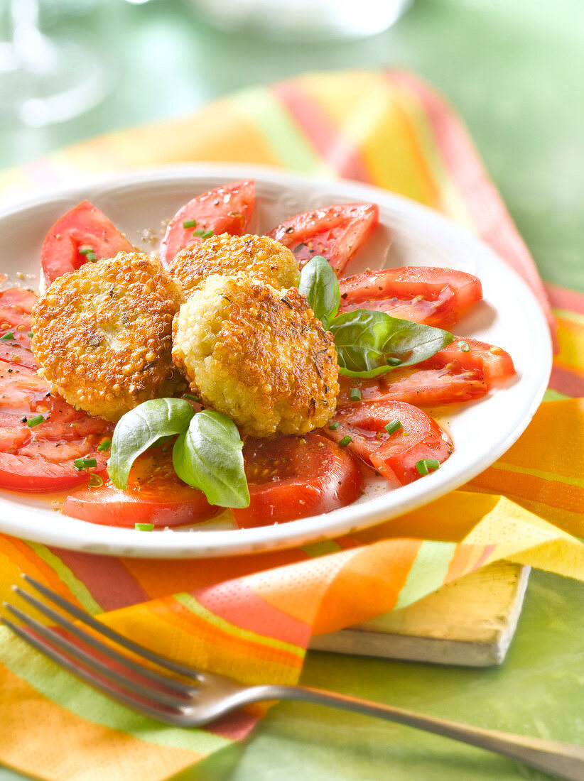 Quinoa,parmesan and basil Croquettes with tomato salad