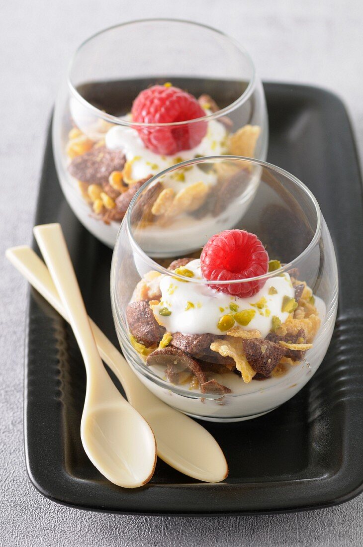 Yoghurt mousse with pistachios and two types of cereals