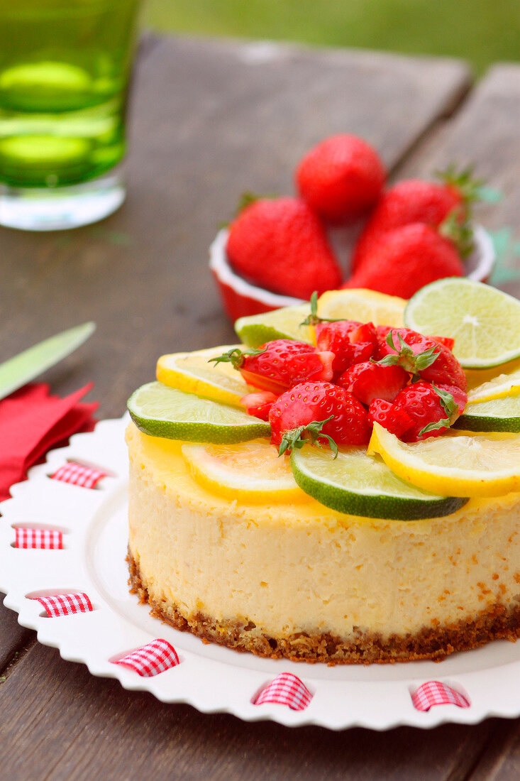 Lemon-lime cheesecake topped with strawberries
