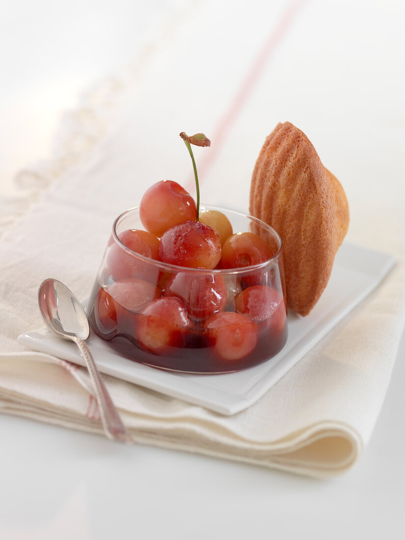 Sauteed cherries in Kirsch with a Madeleine