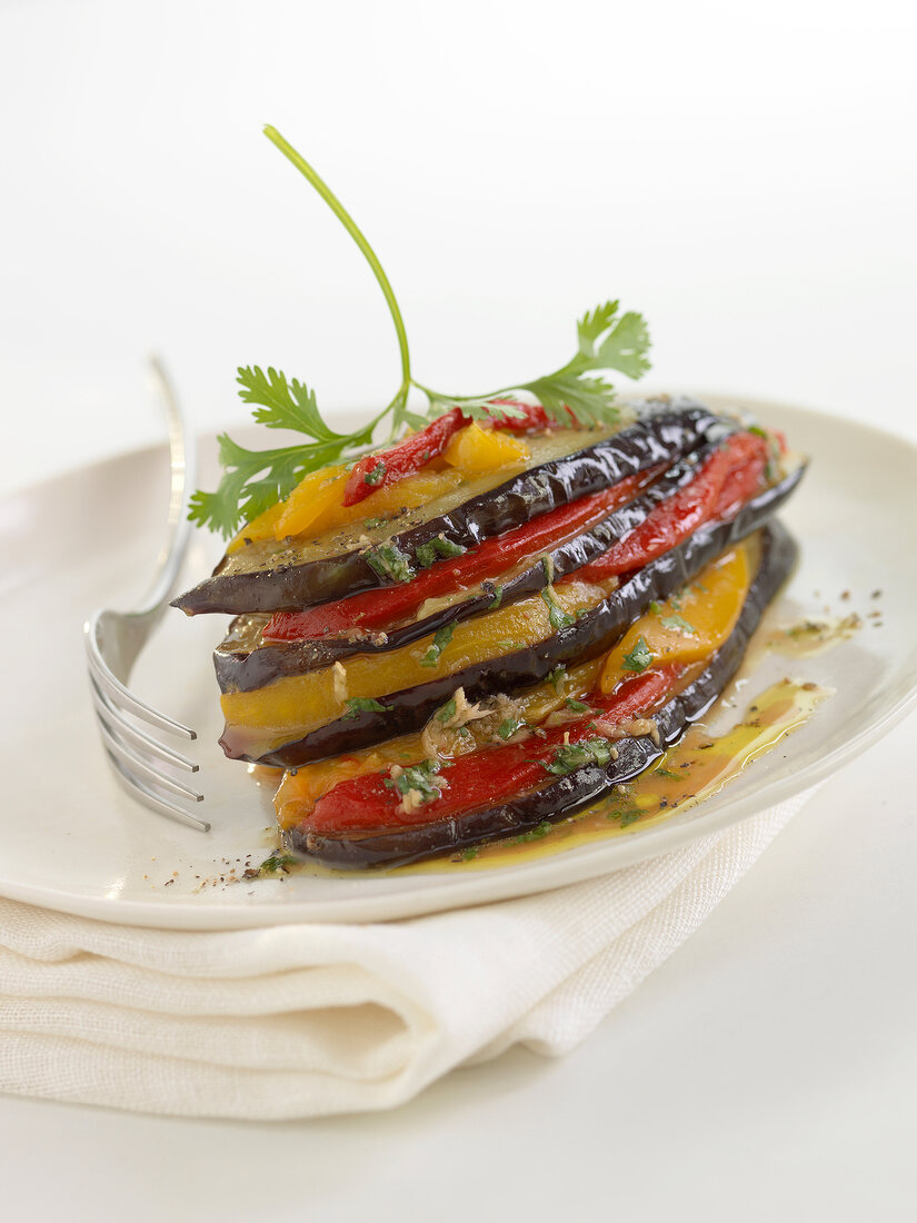 Eggplant and pepper lasagnes with herbs