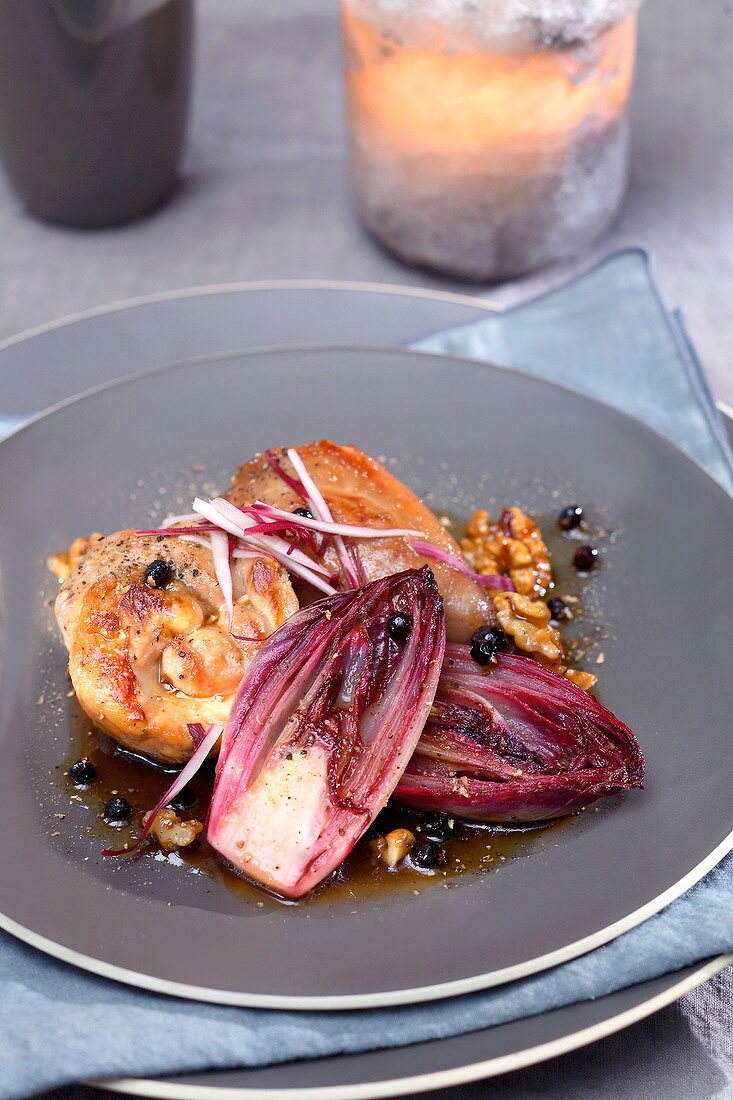 Roasted guinea-fowl with red chicory and braised Carmines