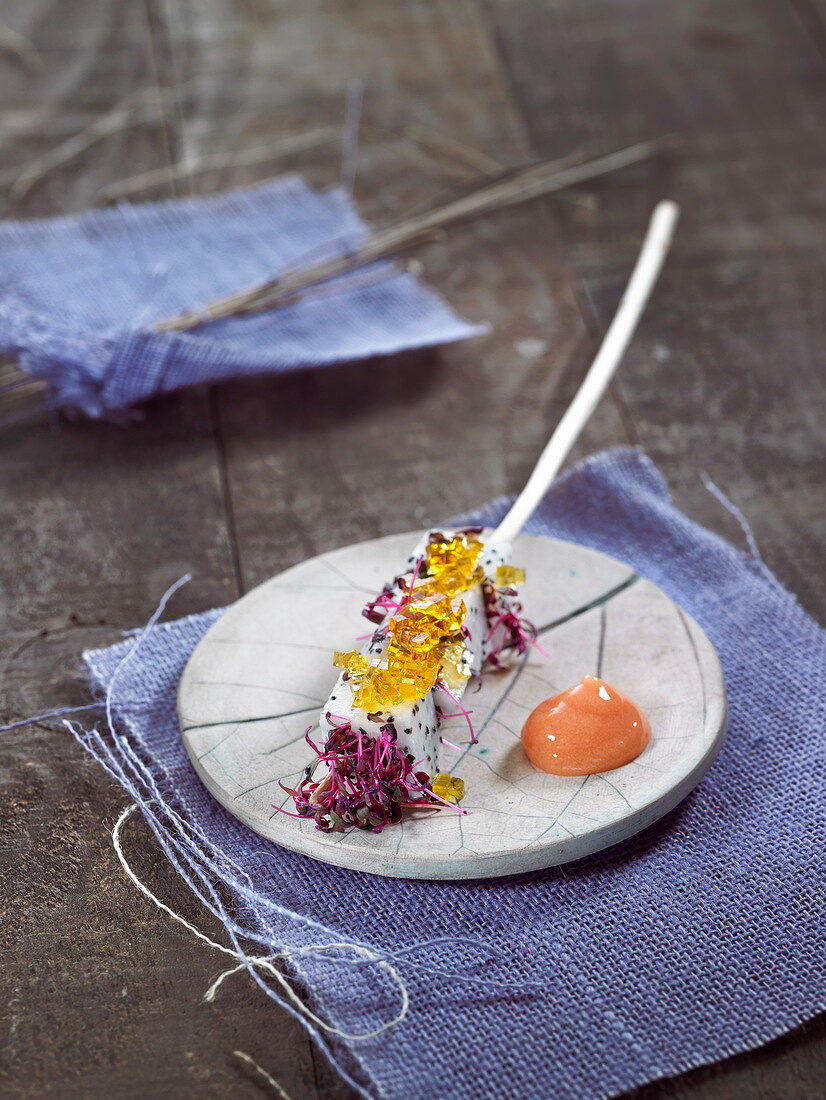 Pitahaya and sprout brochette, pink grapefruit sauce