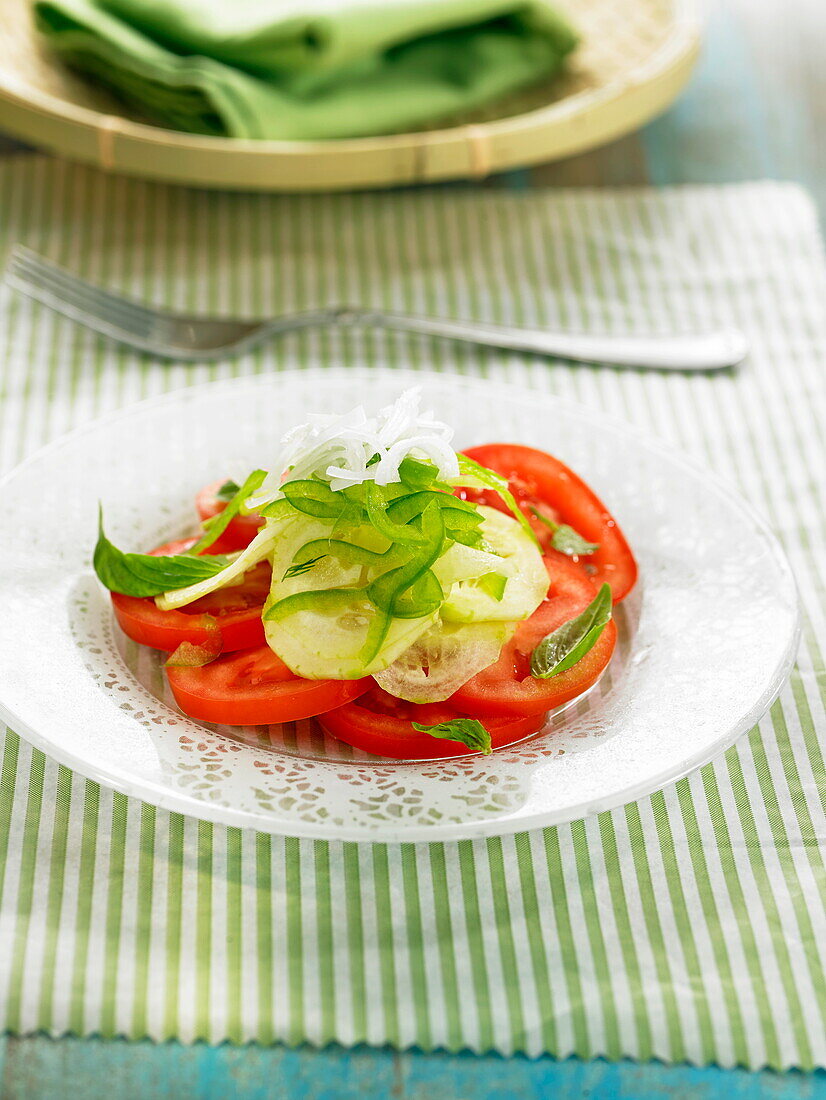 Tomato, cucumber and green bell pepper salad