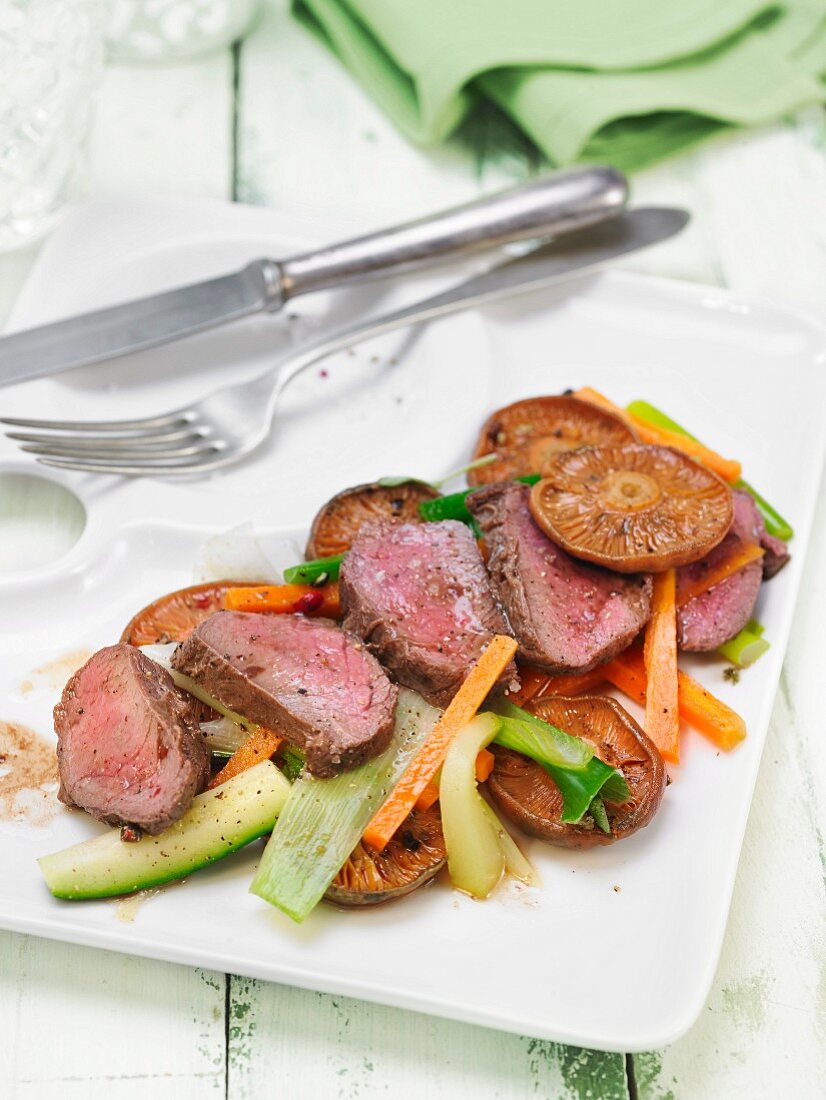 Stag fillet with mushrooms and vegetables