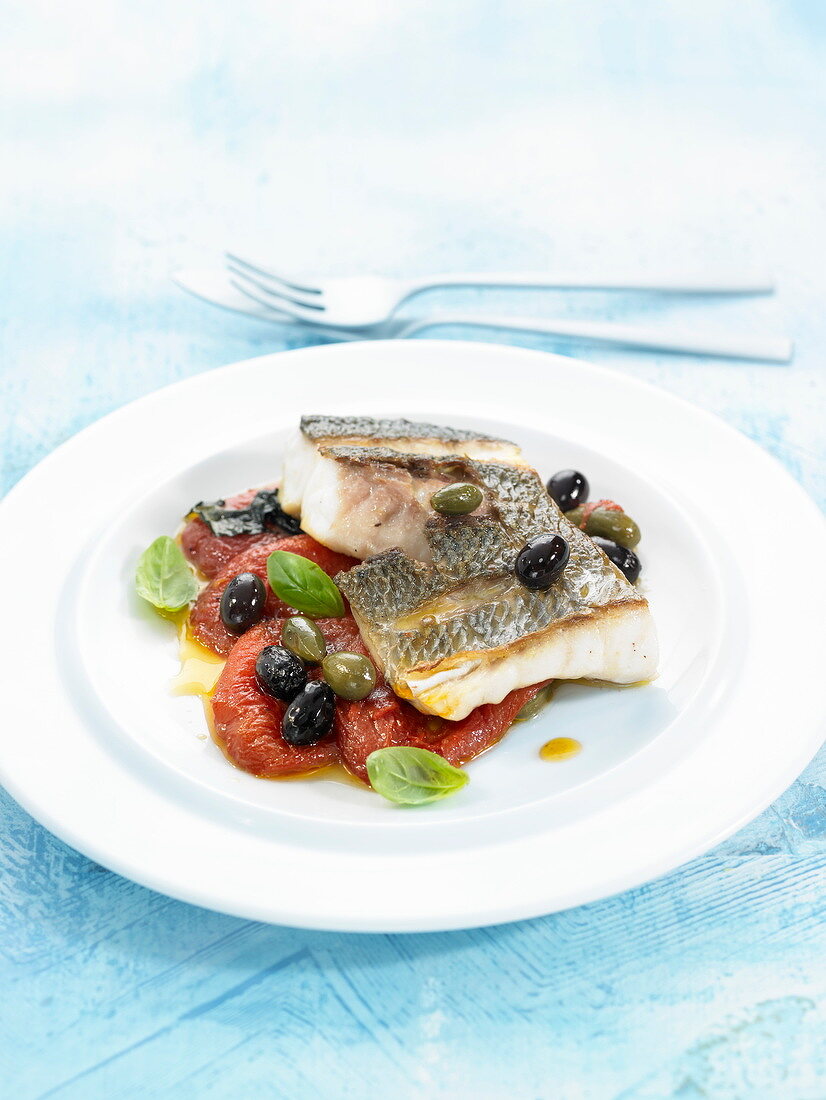 Roasted sea bream with tomatoes and olives
