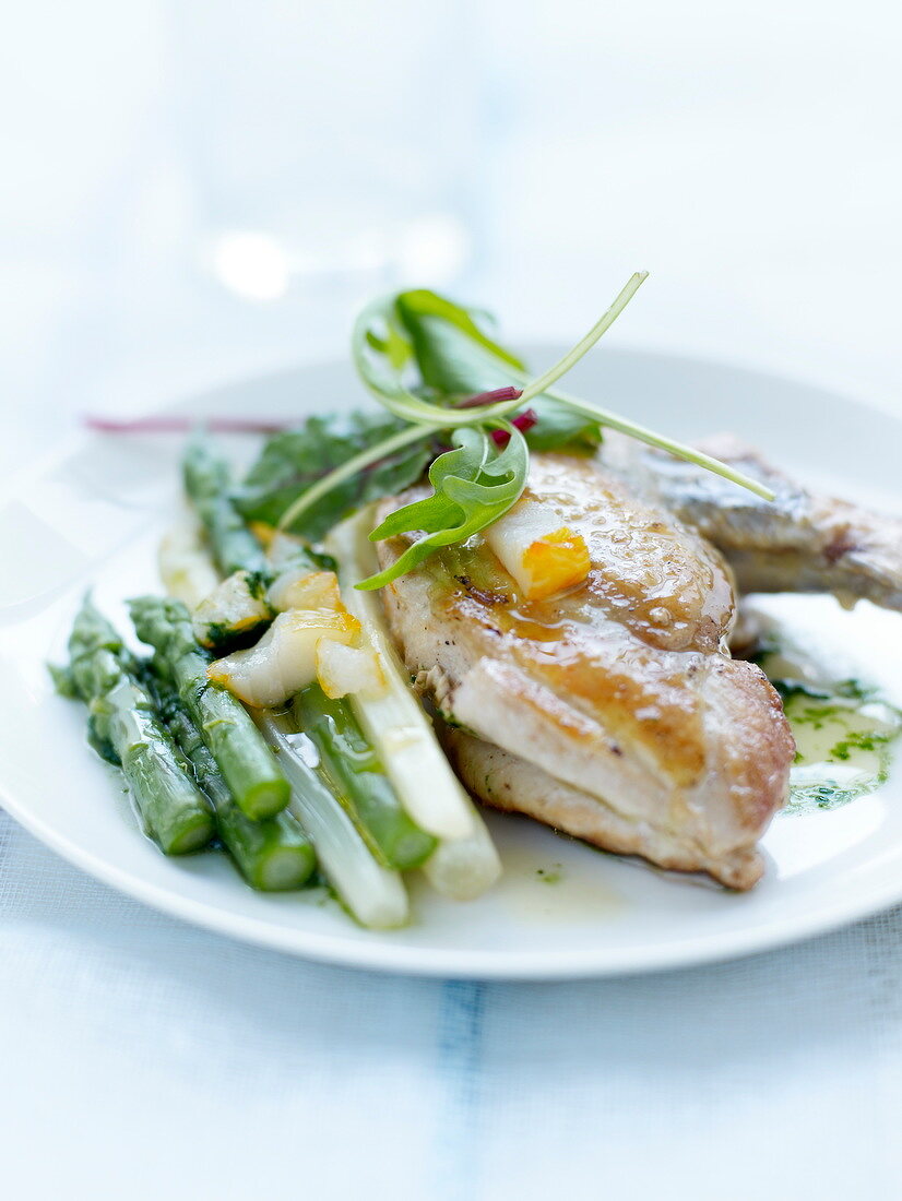 Guinea-fowl with green and white asparagus and haddock