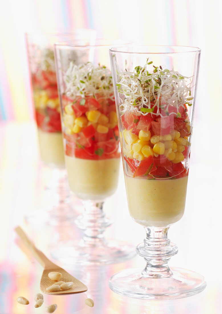 Cream of sweetcorn with diced tomatoes and sprouts
