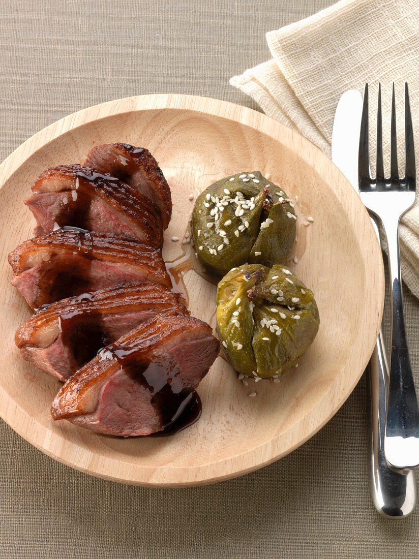 Duck breast with roasted figs and sesame seeds