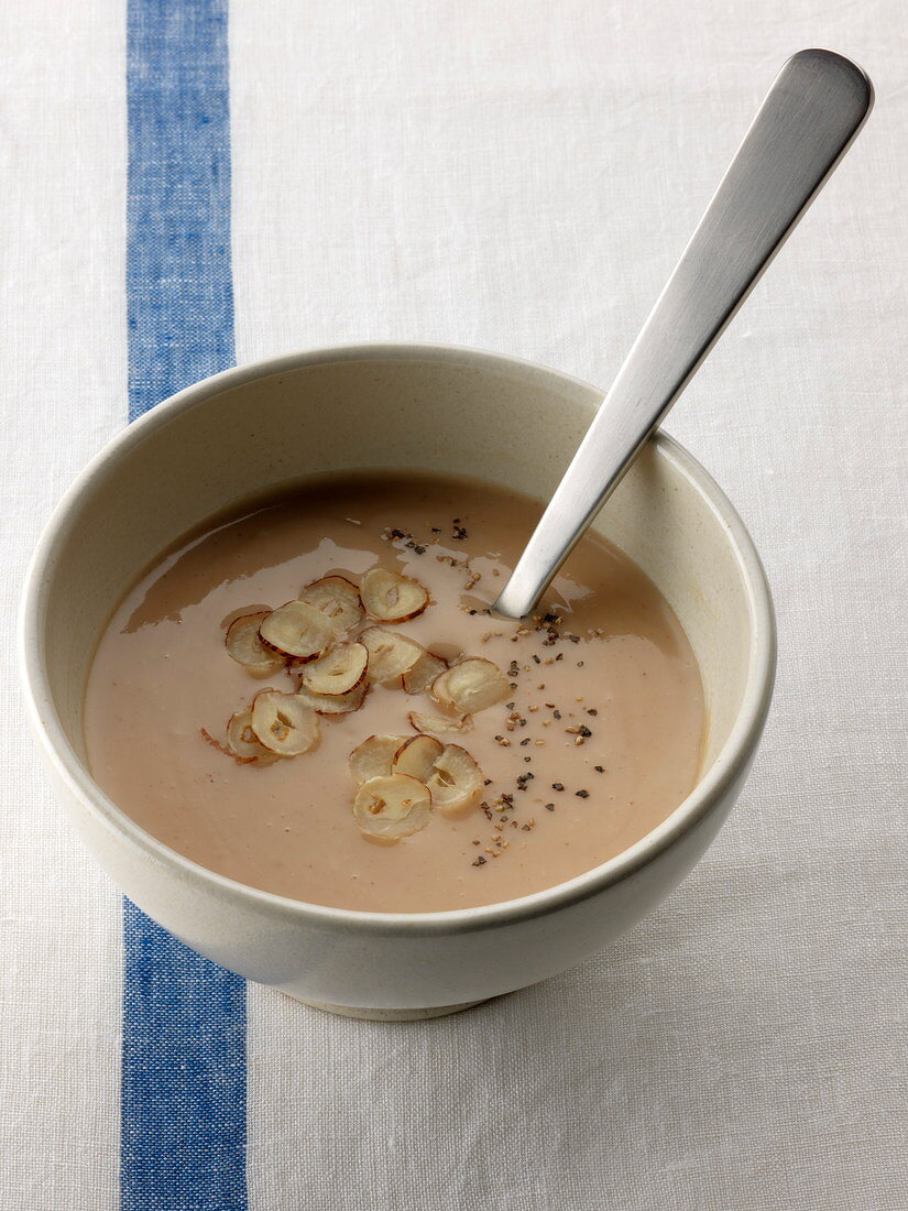 Cream of chestnut soup with sliced hazelnuts