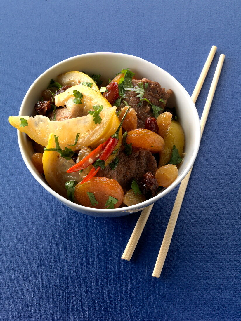 Sauteed pork with confit citrus, raisins and dried apricots