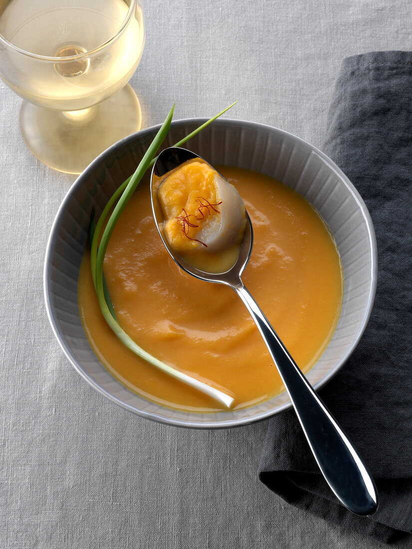 Cream of pumpkin soup with scallops