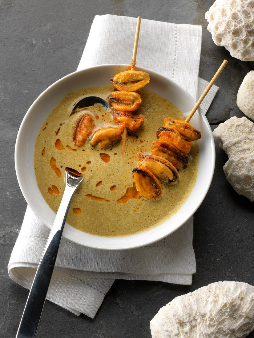 Cream of Paimpol haricot bean soup with paprika mussel brochettes