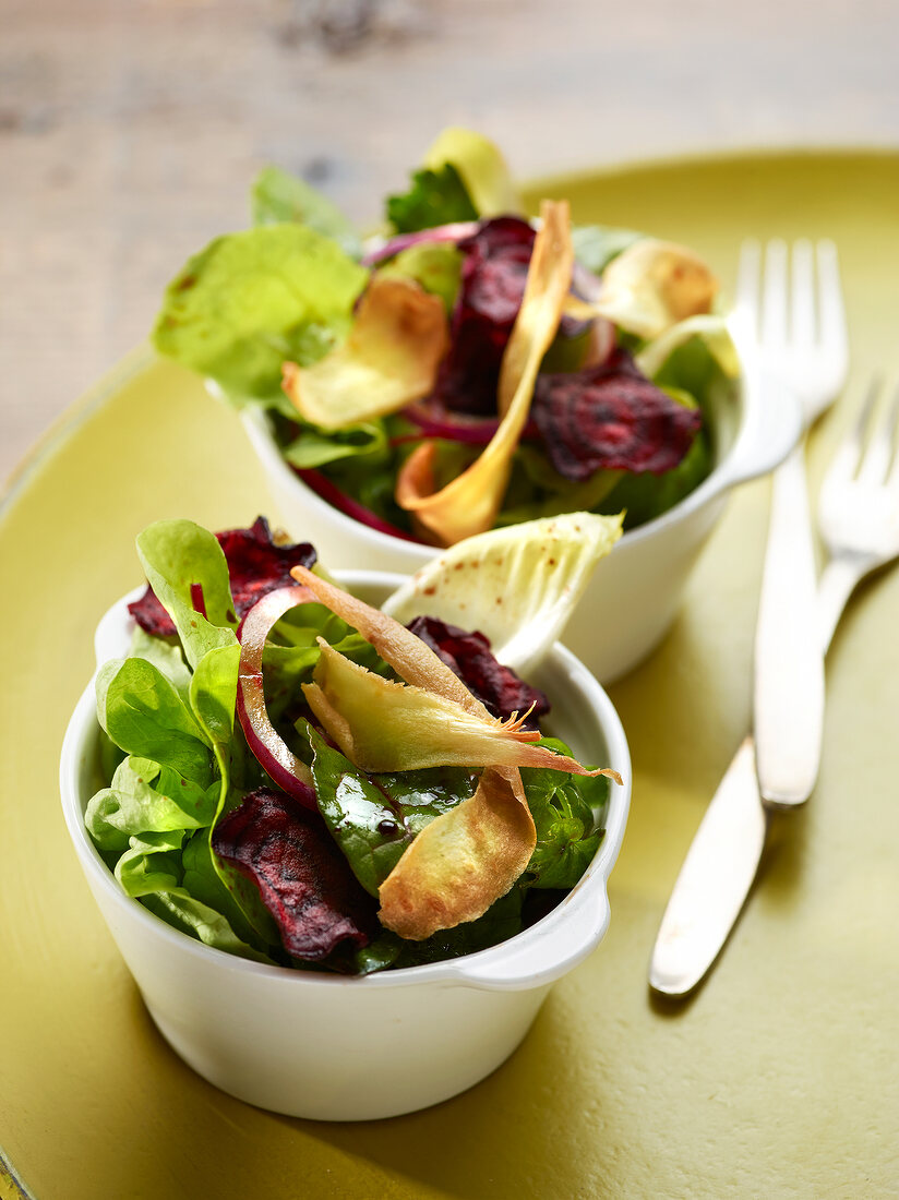 Mesclun, red onion and fried beetroot and parsnip salad