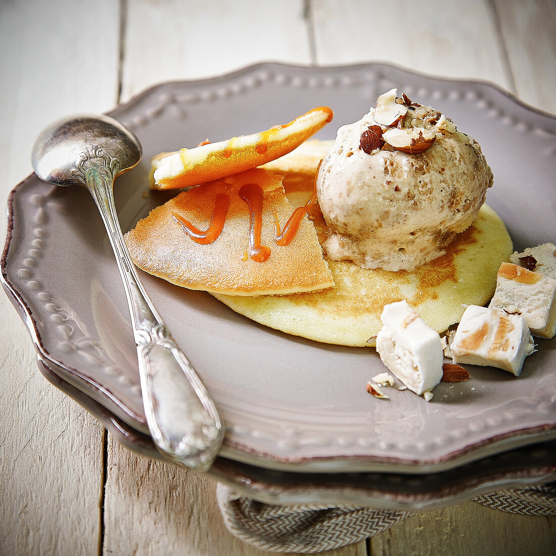 Pancakes with toffee sauce and nougat ice cream
