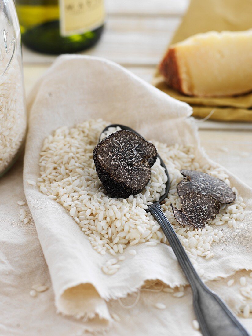 White rice with a black truffle for risotto