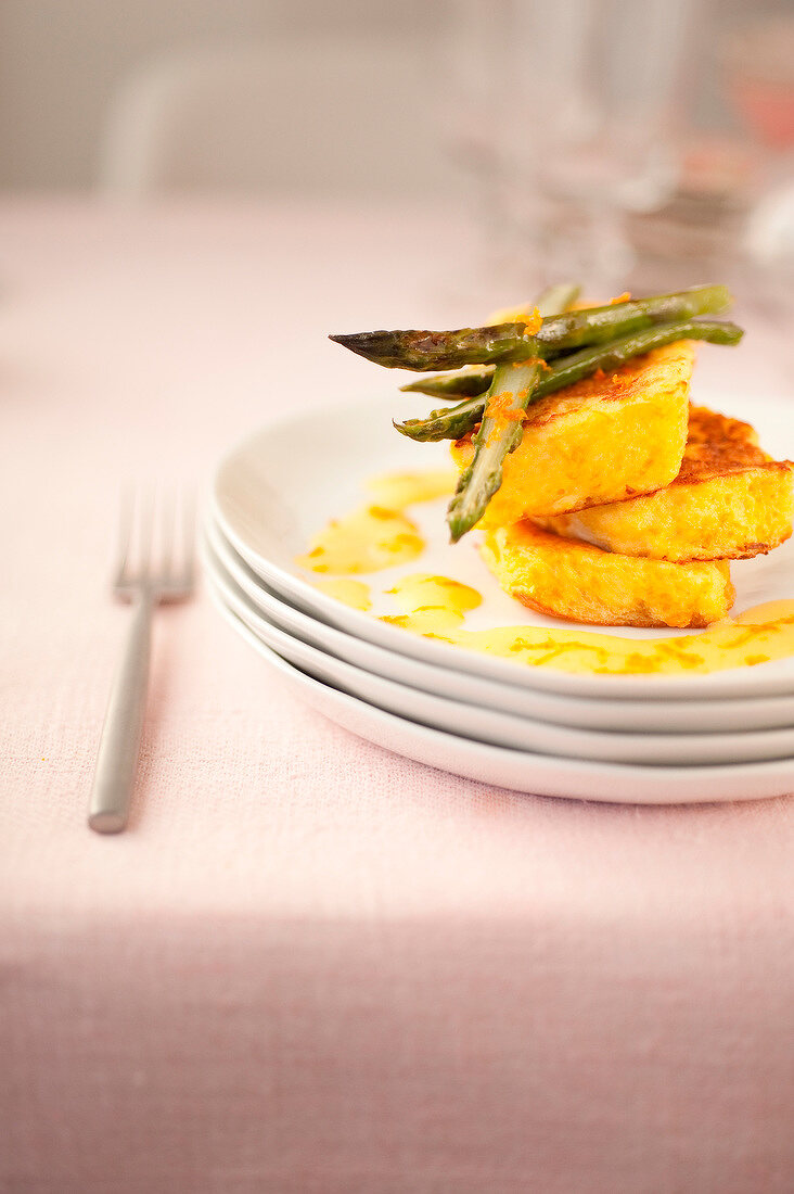 French toast with green asparagus and orange-flavored white butter sauce