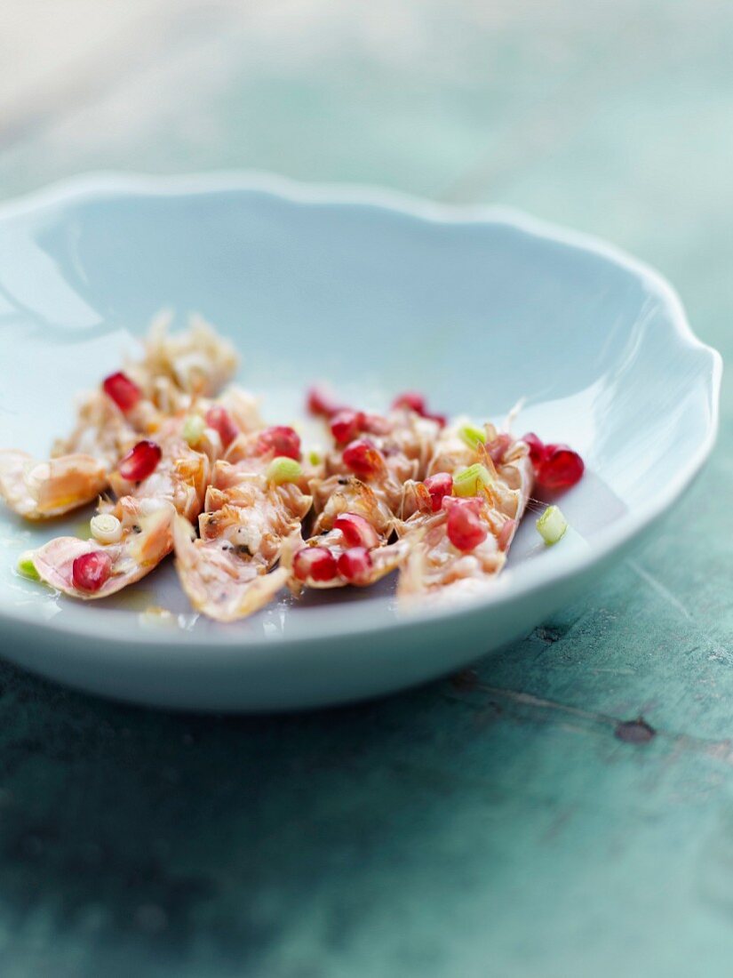 Grilled Dublin Bay prawns in pomegranate sauce